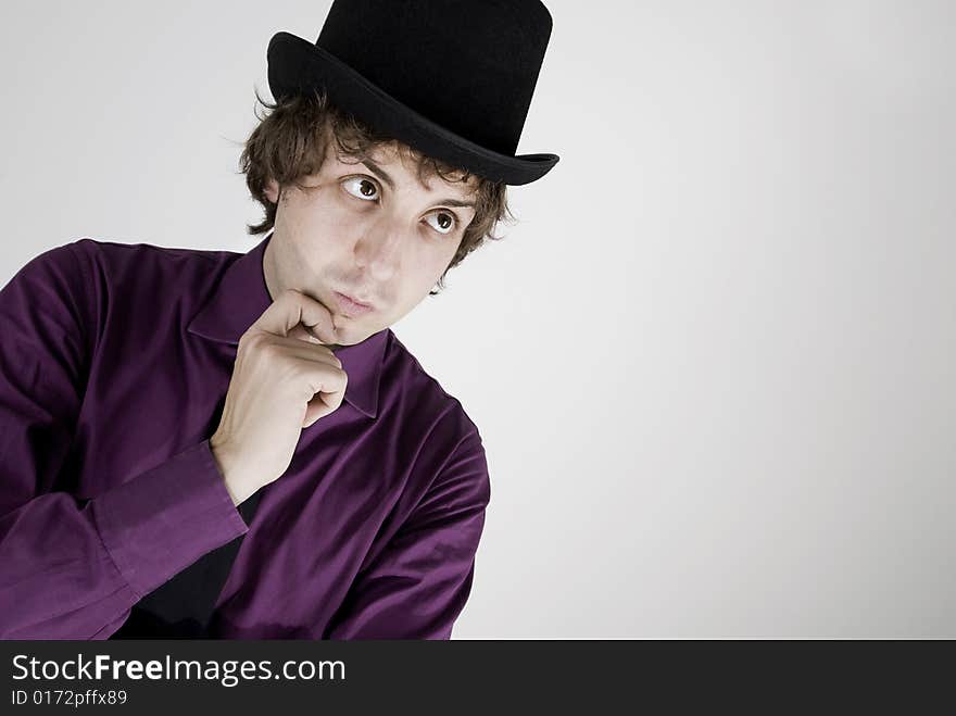 Elegant show man with purple shirt and top hat on white background. Elegant show man with purple shirt and top hat on white background