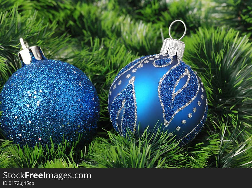 Christmas background. New Year's toys and ornaments bright and glow. Christmas background. New Year's toys and ornaments bright and glow