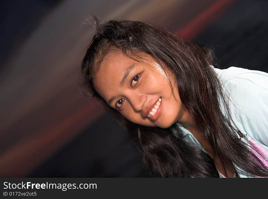 Photograph of sweet asian girl in evening