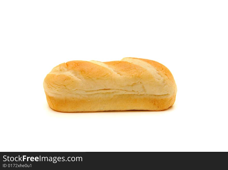 One fresh bread roll on white background