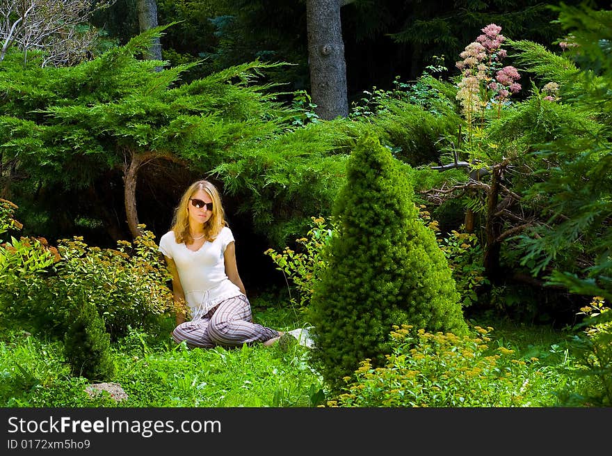 Pretty woman in botanic garden. Pretty woman in botanic garden