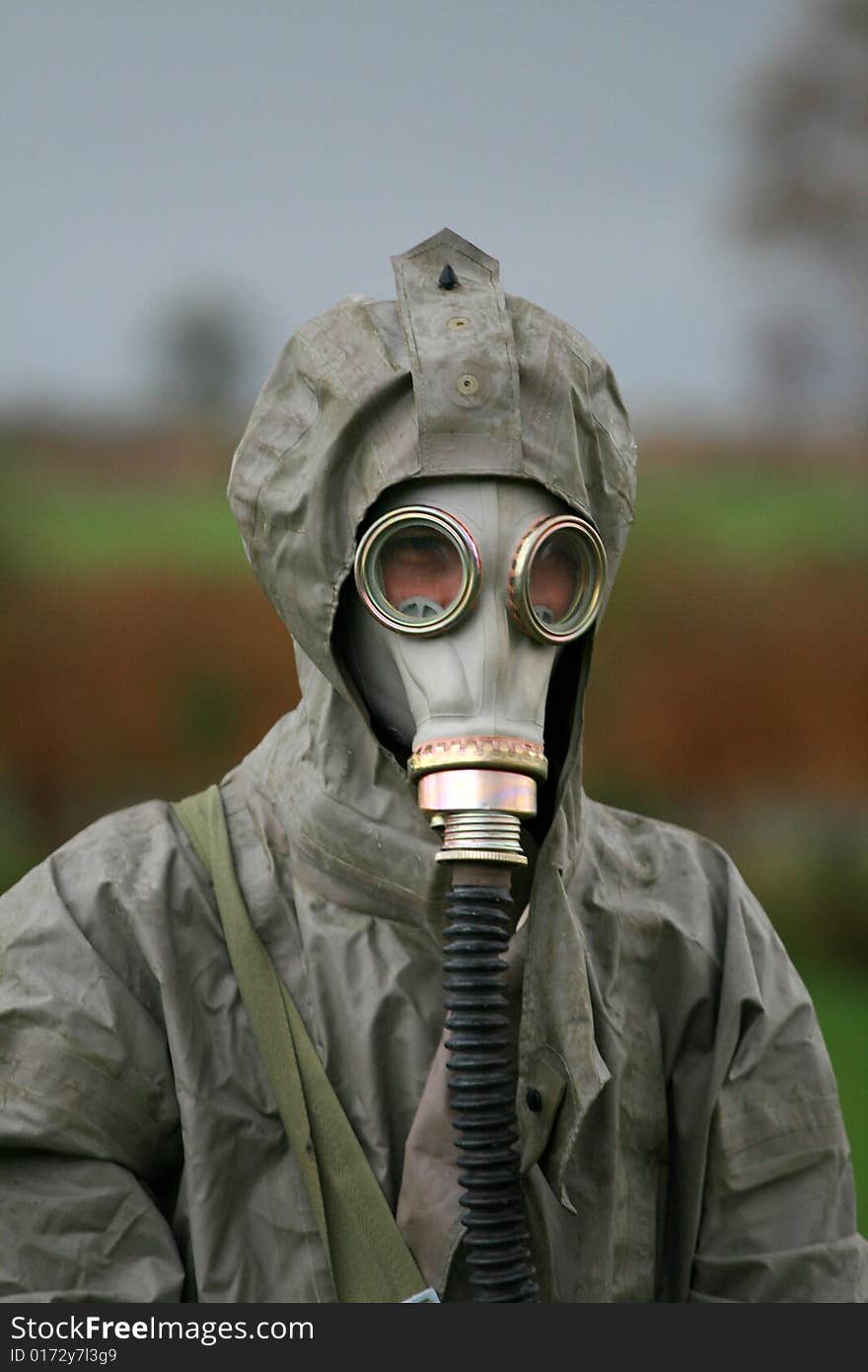 Soldier in the mask during a special disinfecting the city