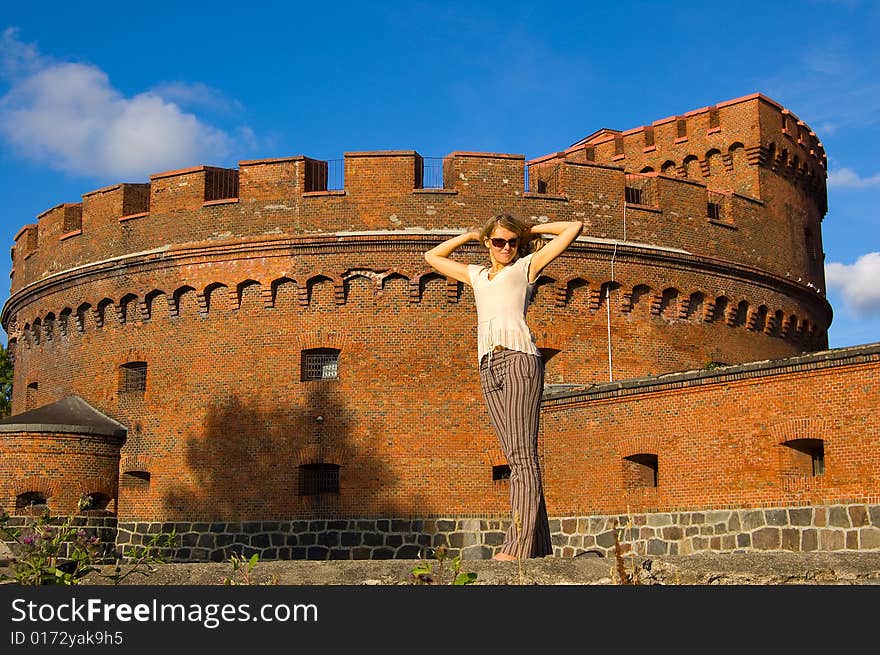 Girl near ancient fort