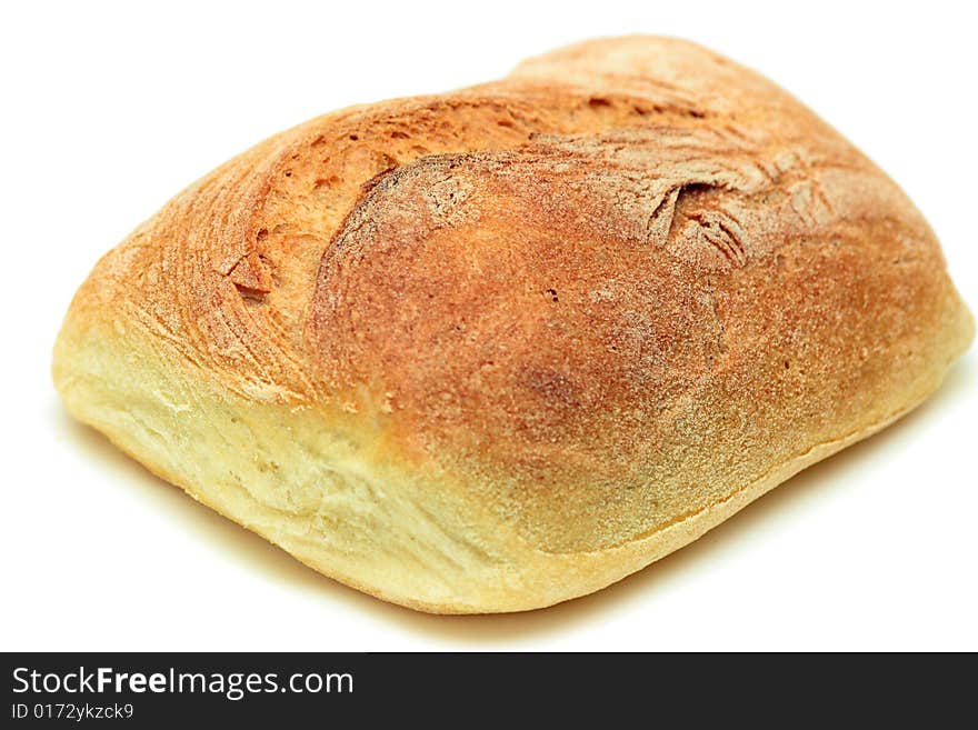 Typical home-made mediterranean bread isolated over white