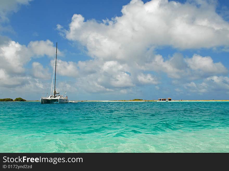 The yacht near a desert island