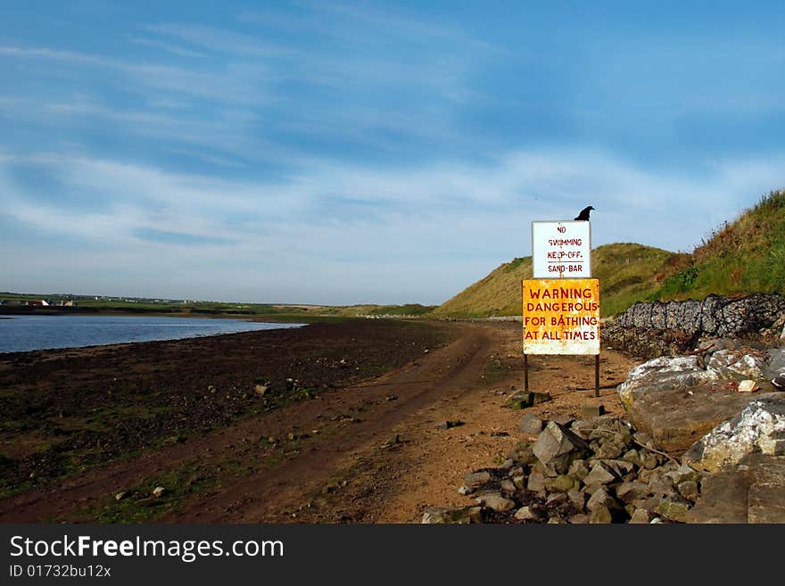 A warning sign for no swimming in kerry ireland. A warning sign for no swimming in kerry ireland