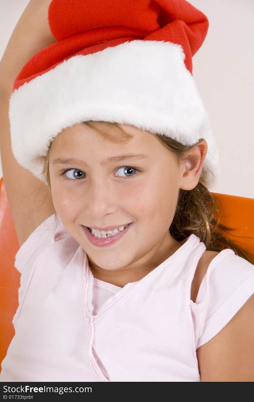 Smiling Little Girl With Christmas Hat