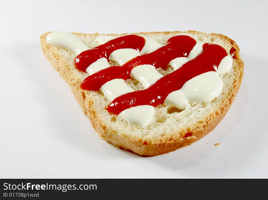 Bread with ketchup and sour cream. Bread with ketchup and sour cream