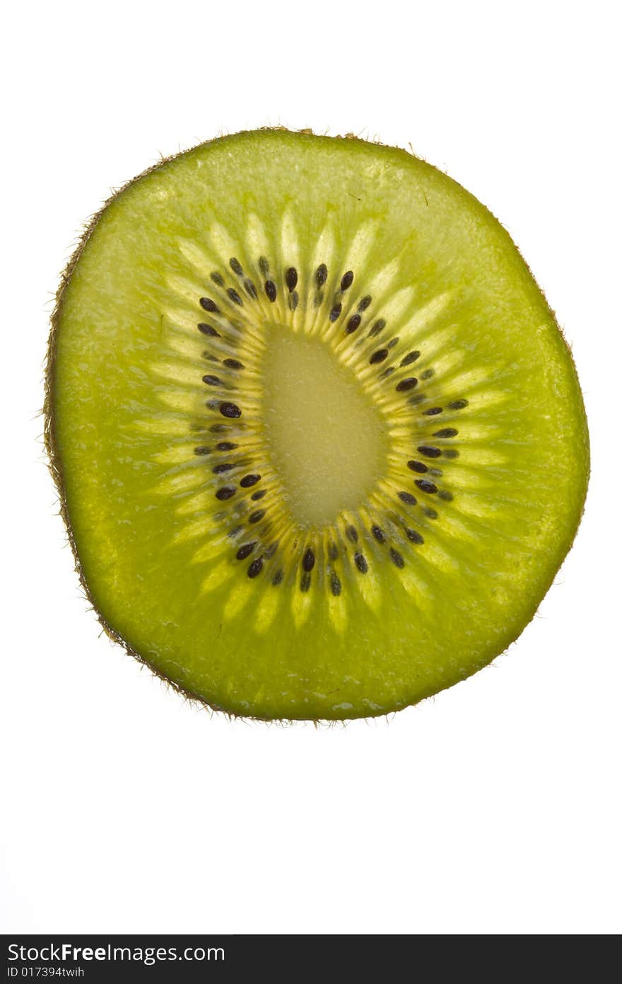 Closeup of a translucent slice of kiwi