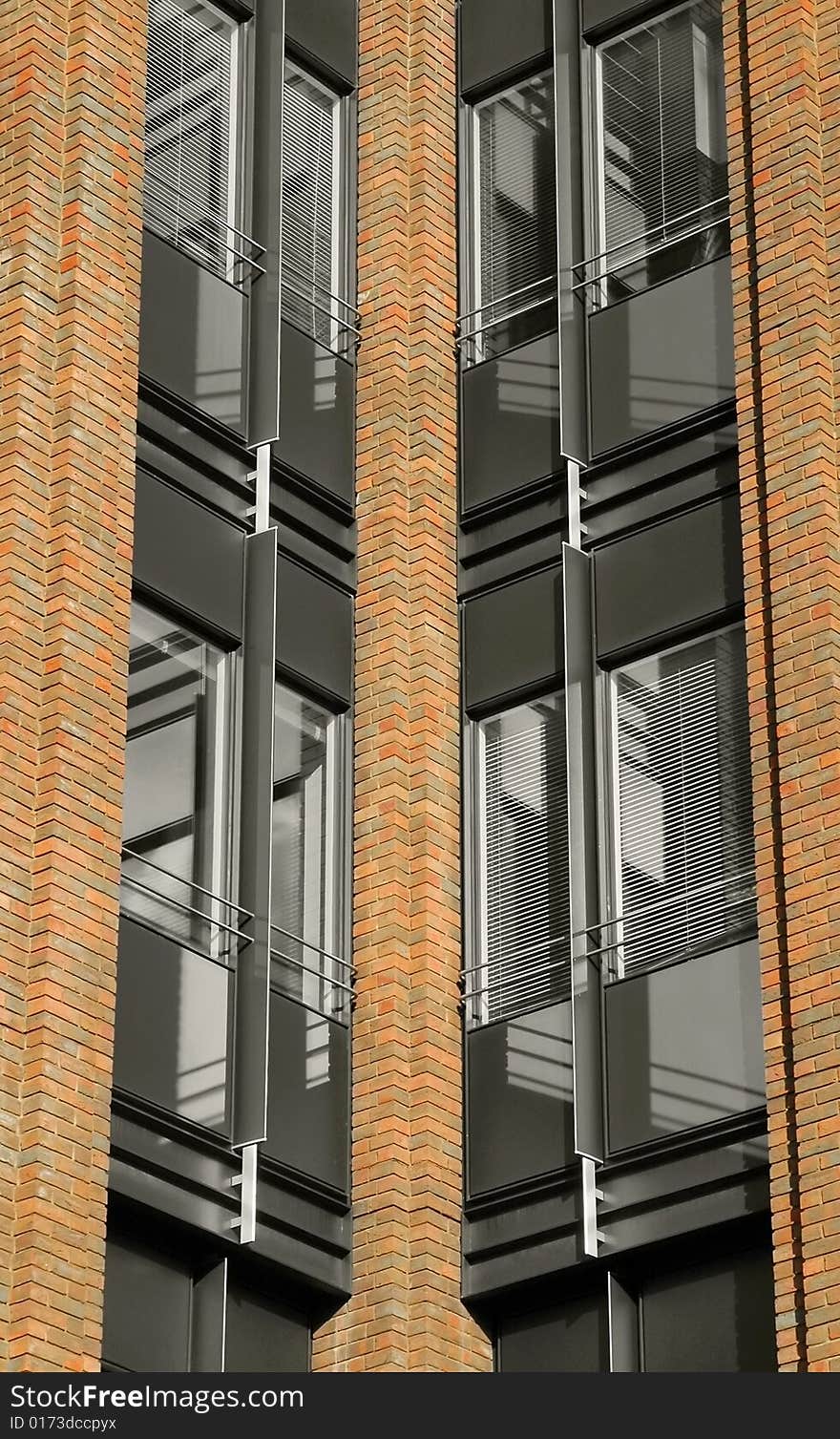 Brick pillar and office window architectural abstract. Brick pillar and office window architectural abstract