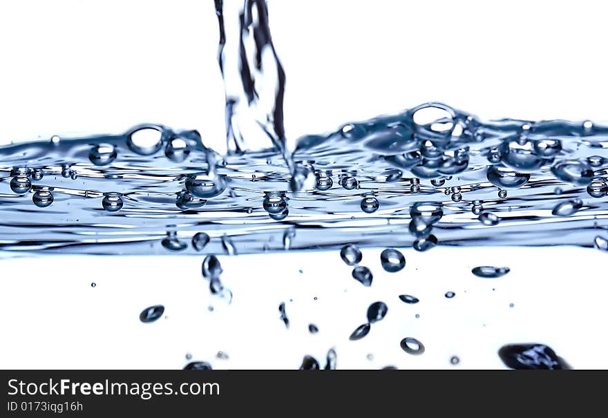 Simple water splash in abstract blue color