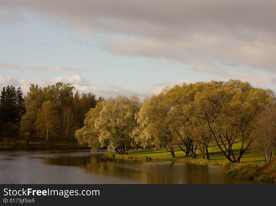 Autumnal pond in garden of the Pavlovck palace, Saint-Petersburg, Russia.