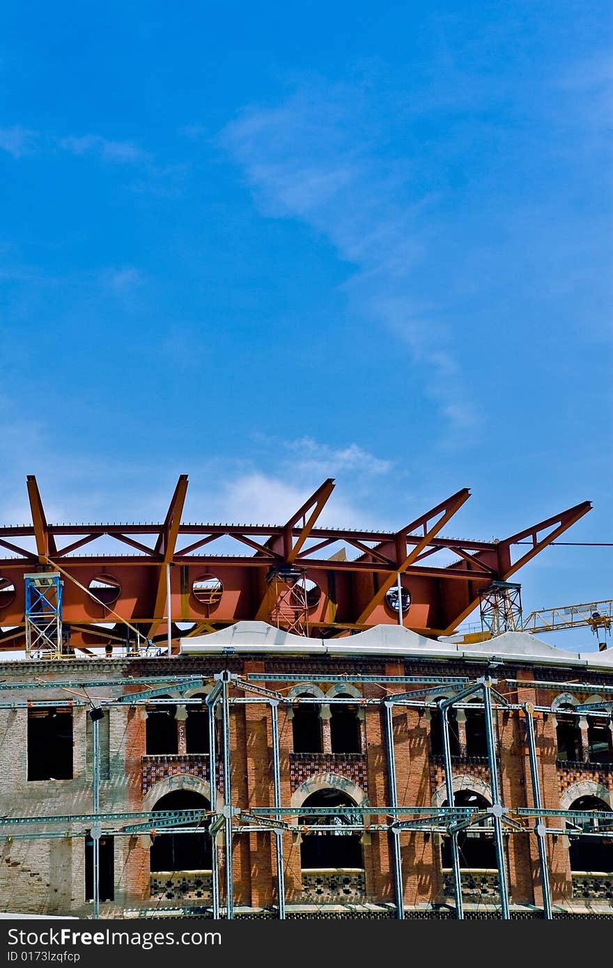 Image of a building facade being rebuilt. Image of a building facade being rebuilt.