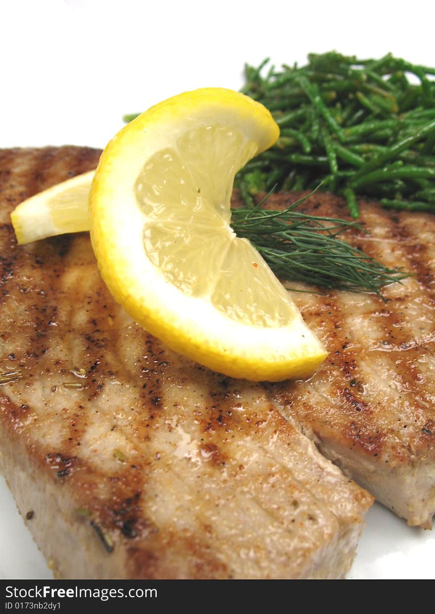 Tuna Steak With Slice Of Lemon