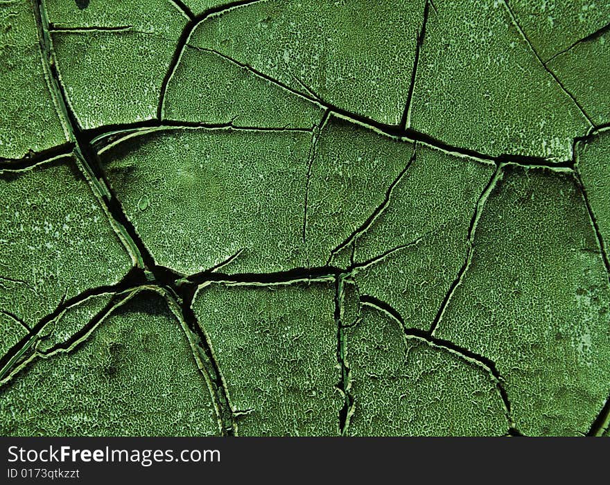 Green, cracked wall texture background. Green, cracked wall texture background.