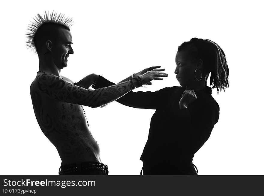 Man with Mohawk and Woman wearing Dreadlocks. Man with Mohawk and Woman wearing Dreadlocks