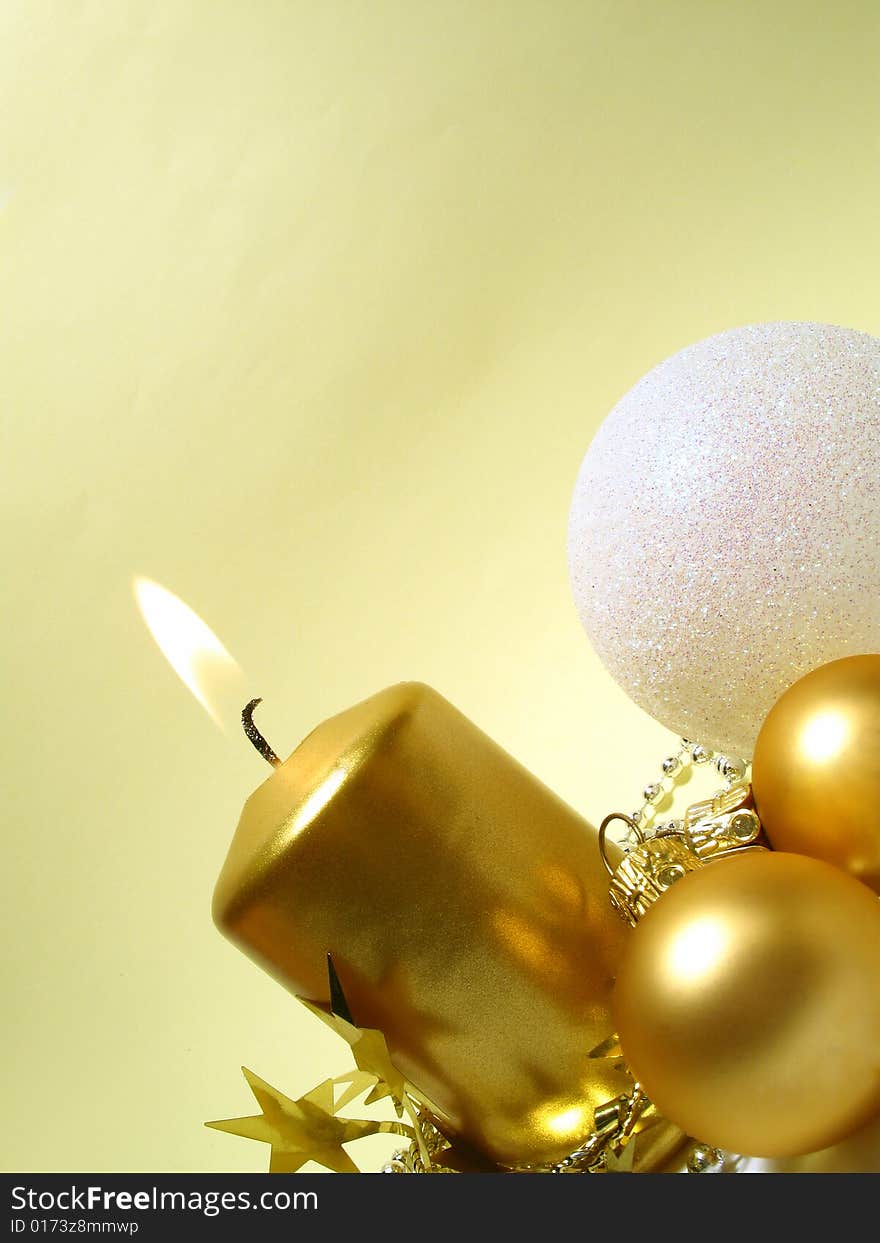 Christmas arrangement with gold candle and balls. Christmas arrangement with gold candle and balls