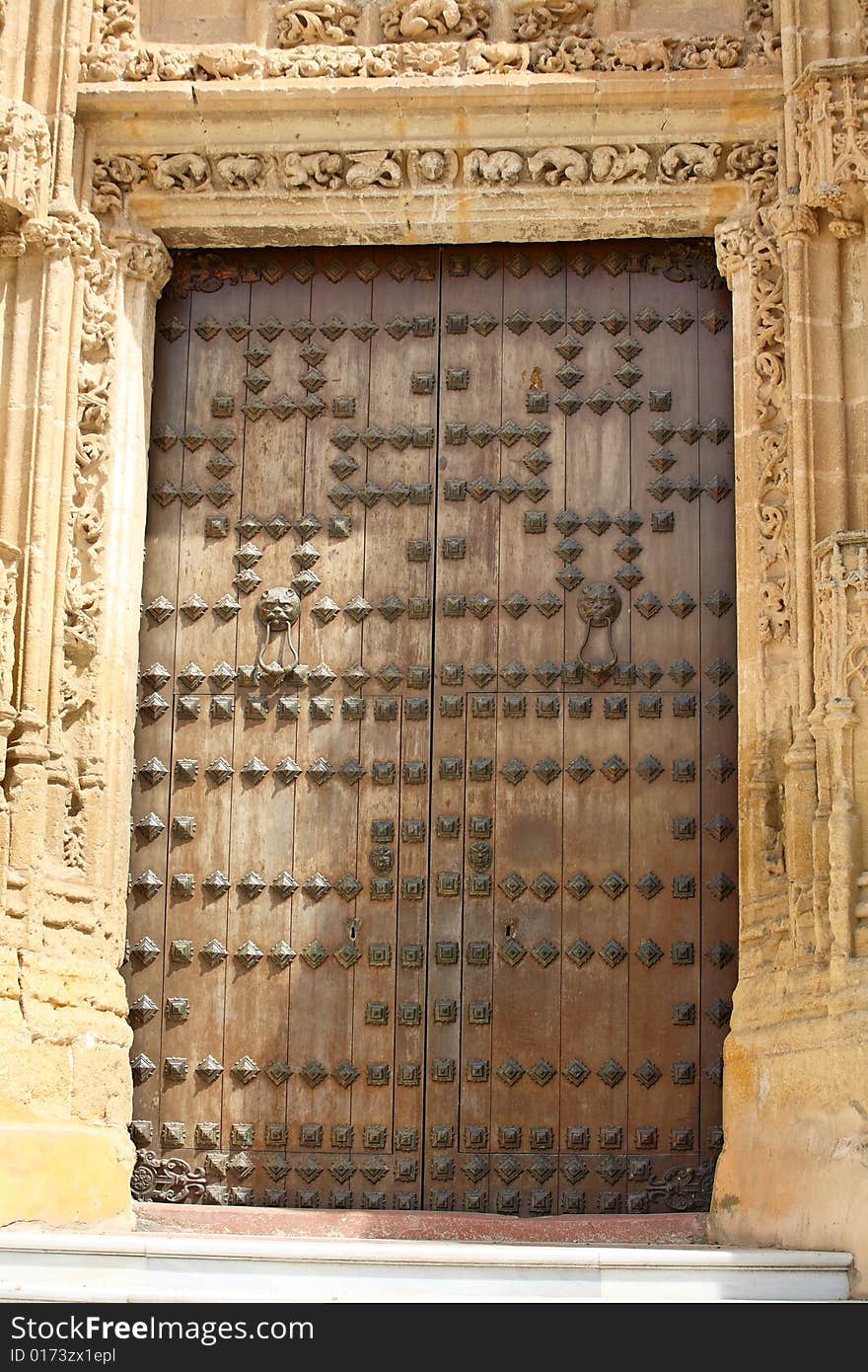 Antique door in Seville, Spain