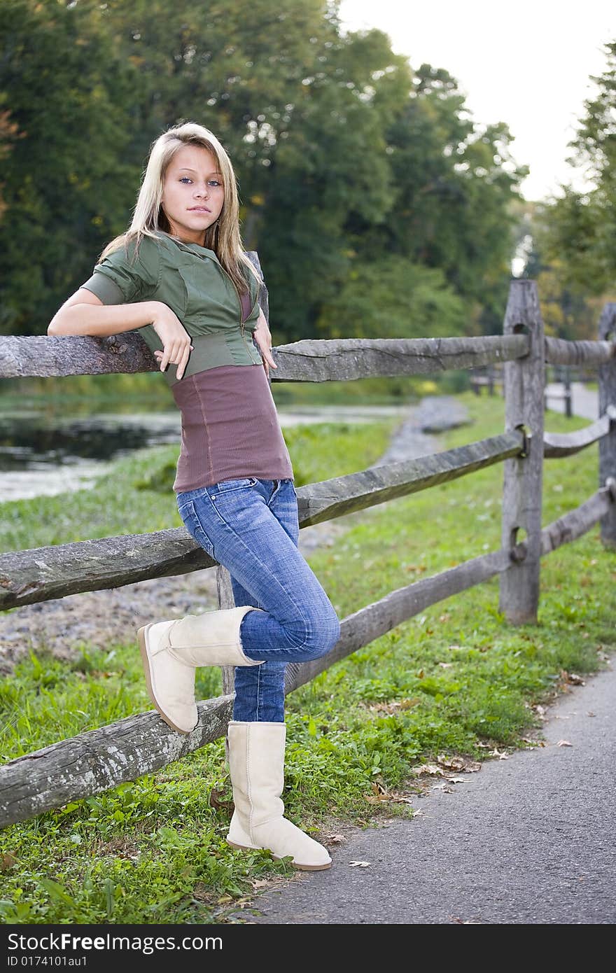 A beautiful blond teenage girl in the park. A beautiful blond teenage girl in the park