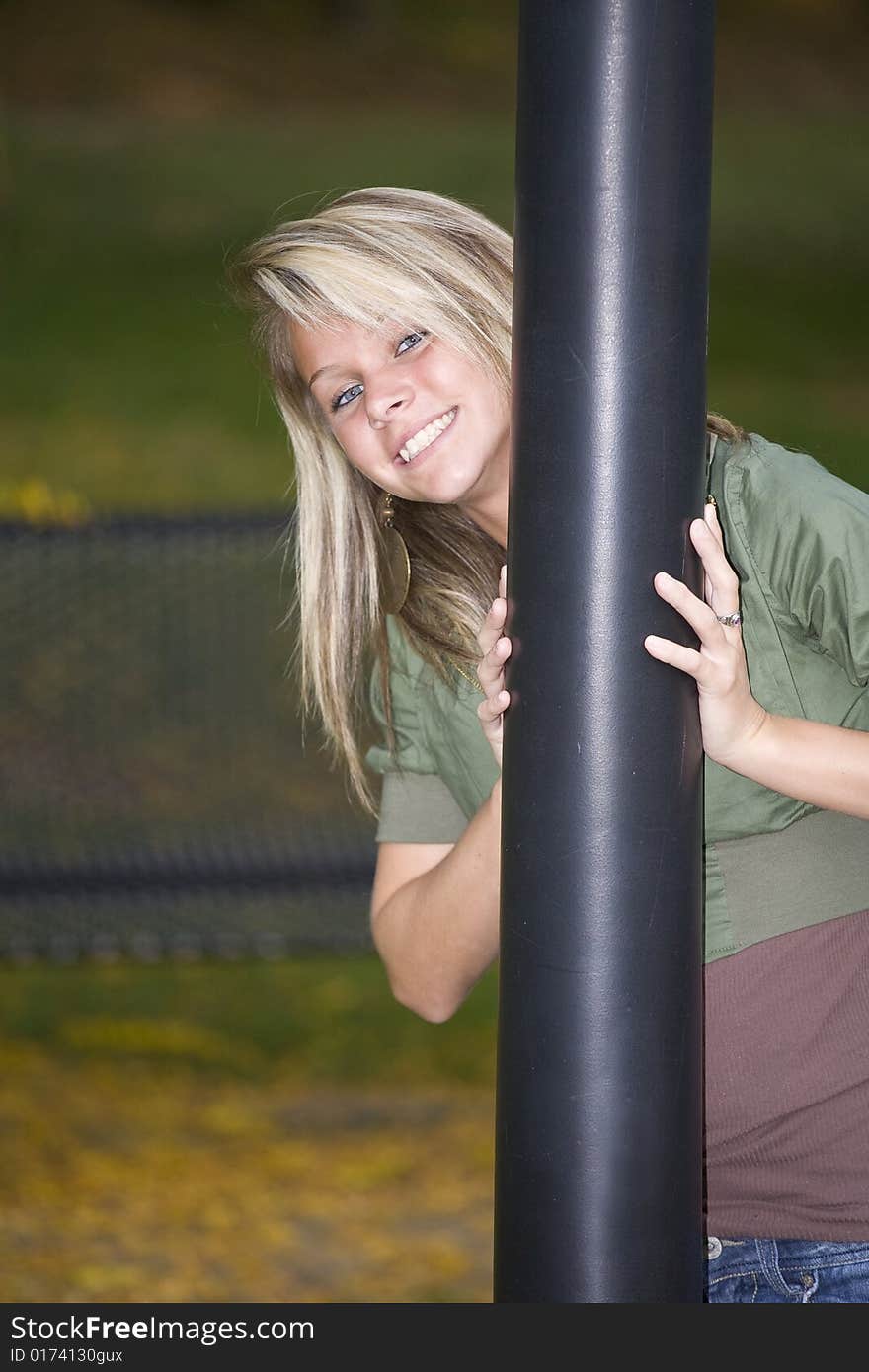 A beautiful blond teenage girl in the park. A beautiful blond teenage girl in the park