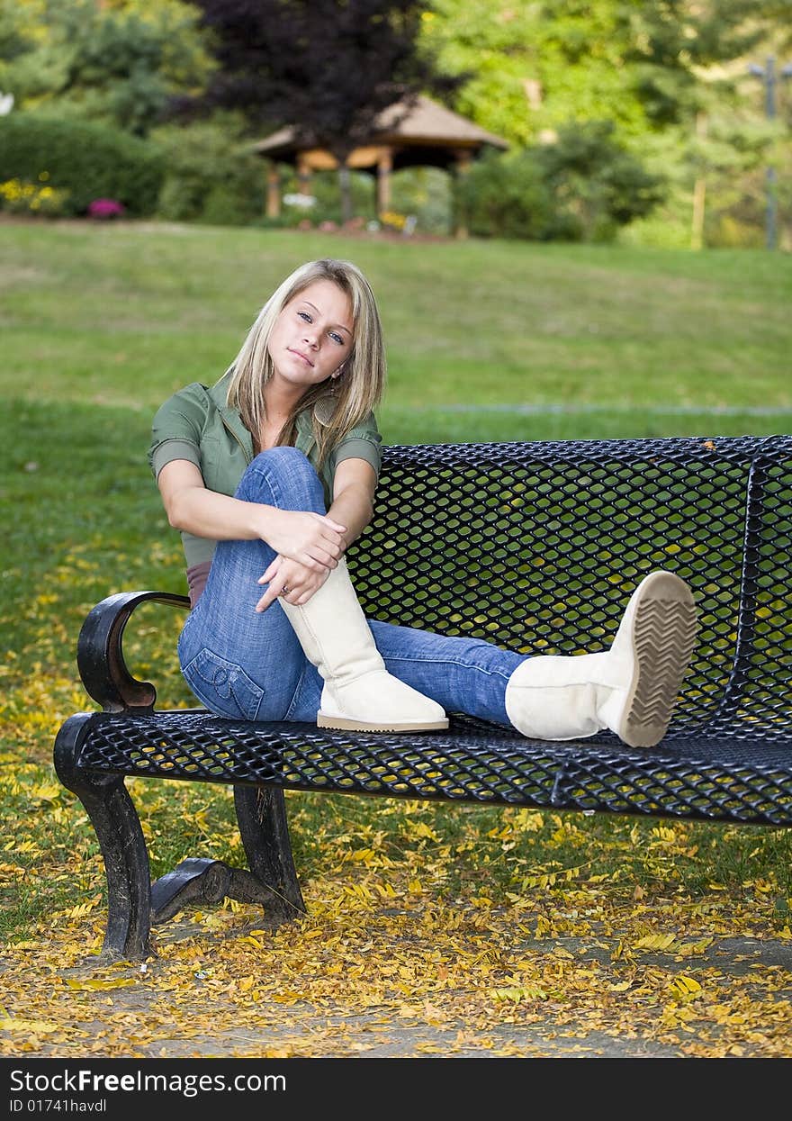 A beautiful blond teenage girl in the park. A beautiful blond teenage girl in the park