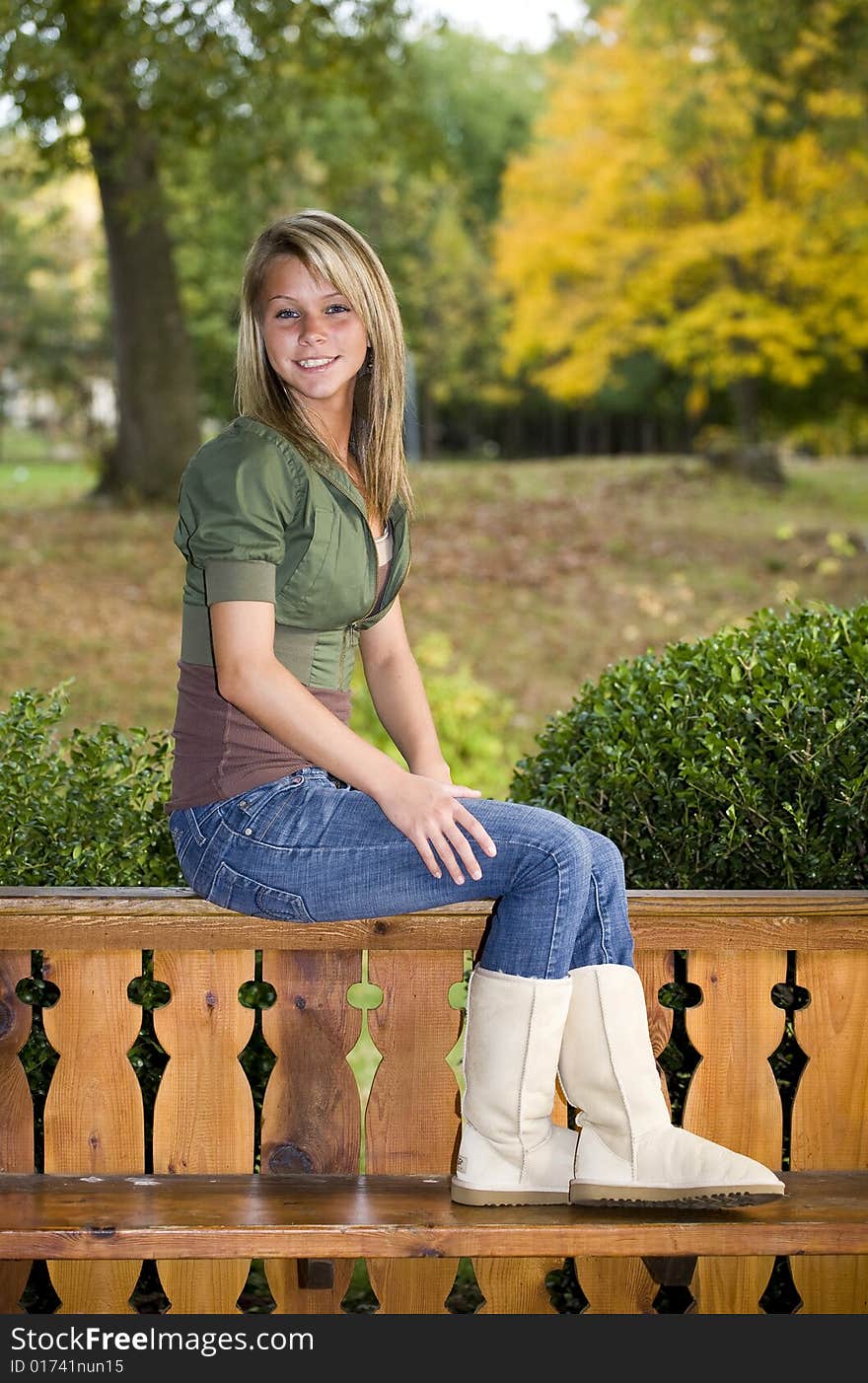 A beautiful blond teenage girl in the park. A beautiful blond teenage girl in the park