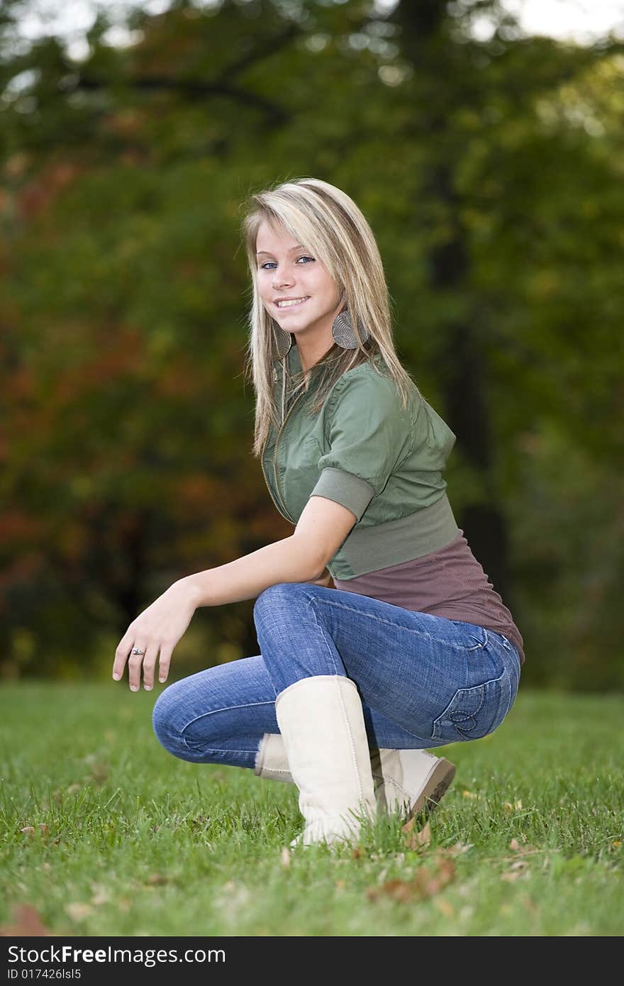 A beautiful blond teenage girl in the park. A beautiful blond teenage girl in the park