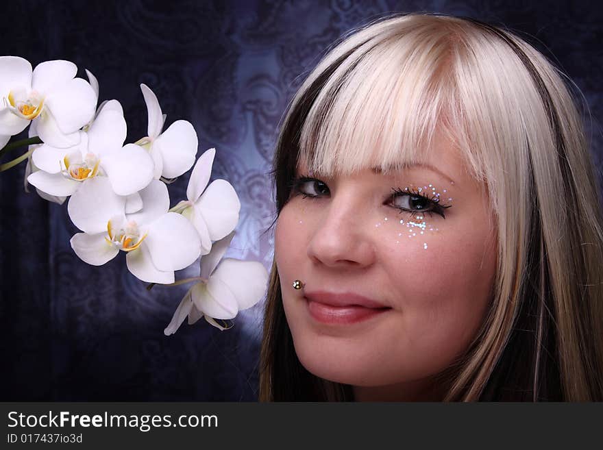 Beautiful young woman and white phalaenopsis orchid. Beautiful young woman and white phalaenopsis orchid