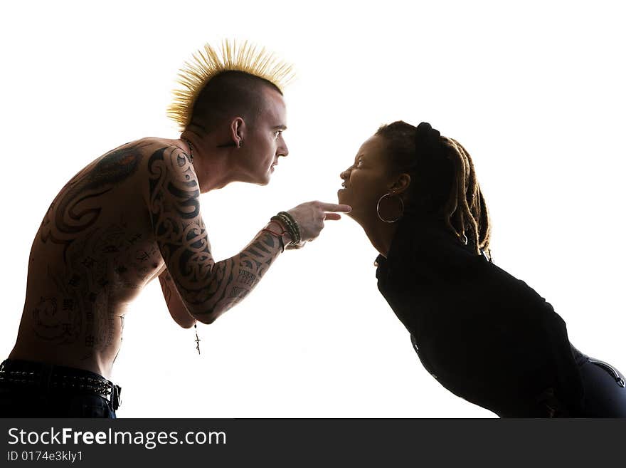 Man with Mohawk and Woman wearing Dreadlocks. Man with Mohawk and Woman wearing Dreadlocks