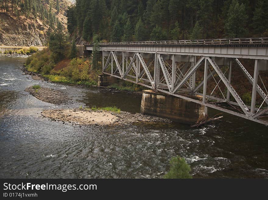 Iron Train Bridge Over Mountain River