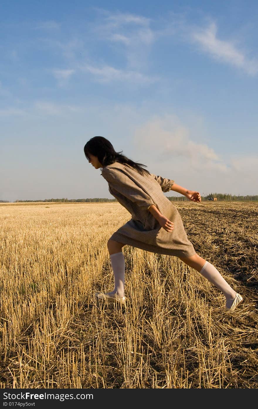 Girl running on the field