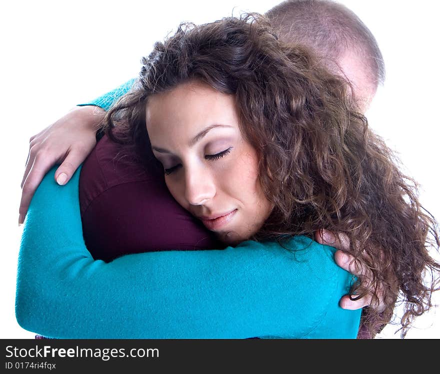 Young love couple smiling isolated on white back