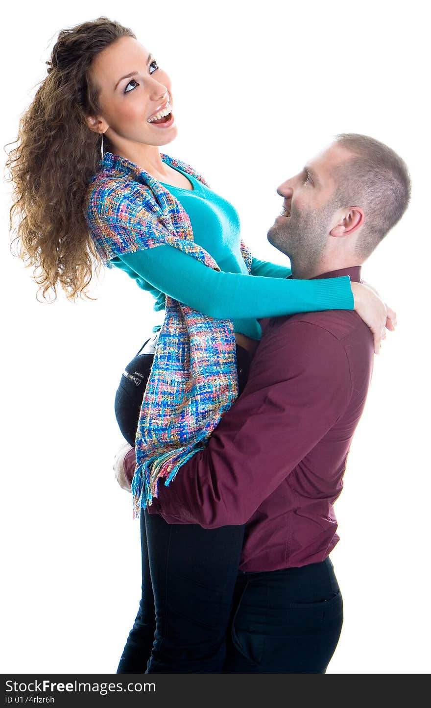 Young love couple smiling isolated on white back