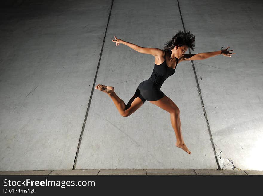 Artistic Picture of a Dancer performing atheletic/ contemporary dance moves. Extremely useful for depicting freedom, modern, artistic expressions. Collection consist of different expressions and muscle movements. Artistic Picture of a Dancer performing atheletic/ contemporary dance moves. Extremely useful for depicting freedom, modern, artistic expressions. Collection consist of different expressions and muscle movements.