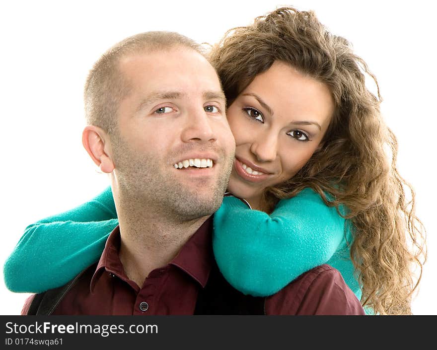 Young love couple smiling isolated on white back