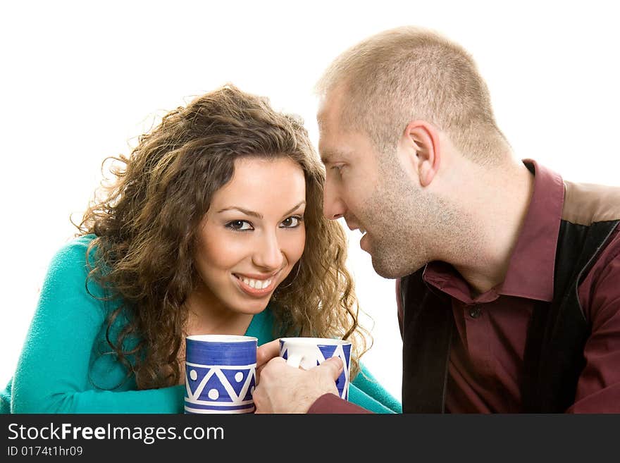 Young love couple smiling isolated on white back