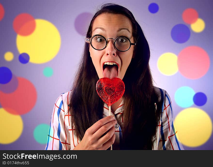 A young woman with lollipop