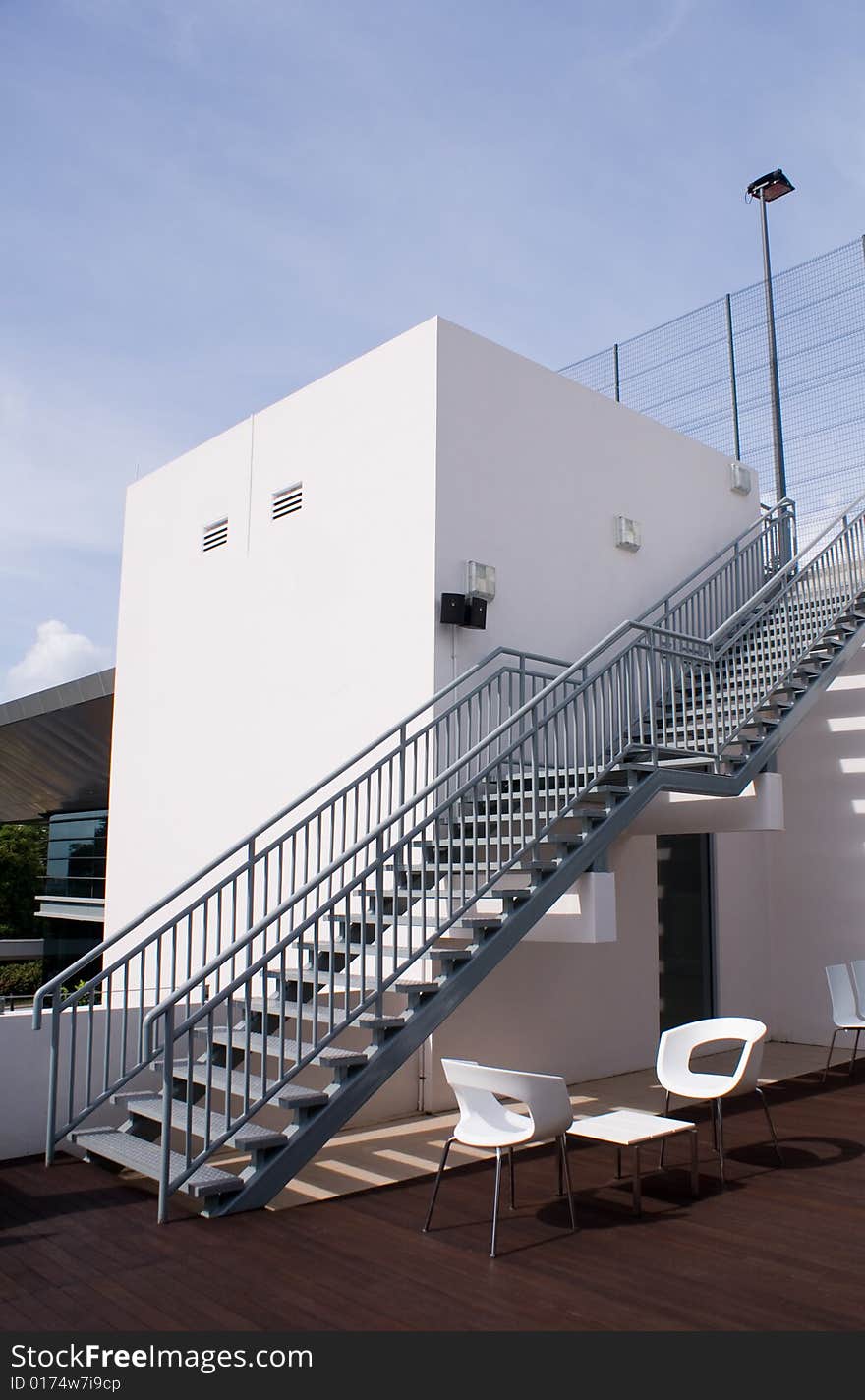 Bar opened on top of building roof with steel chairs