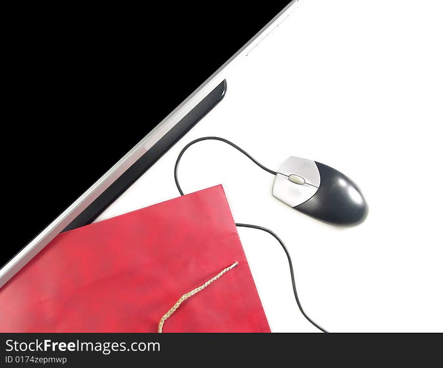 Wide Screen LCD Computer Monitor, Mouse and Gift bag (Isolated on white background). Wide Screen LCD Computer Monitor, Mouse and Gift bag (Isolated on white background)