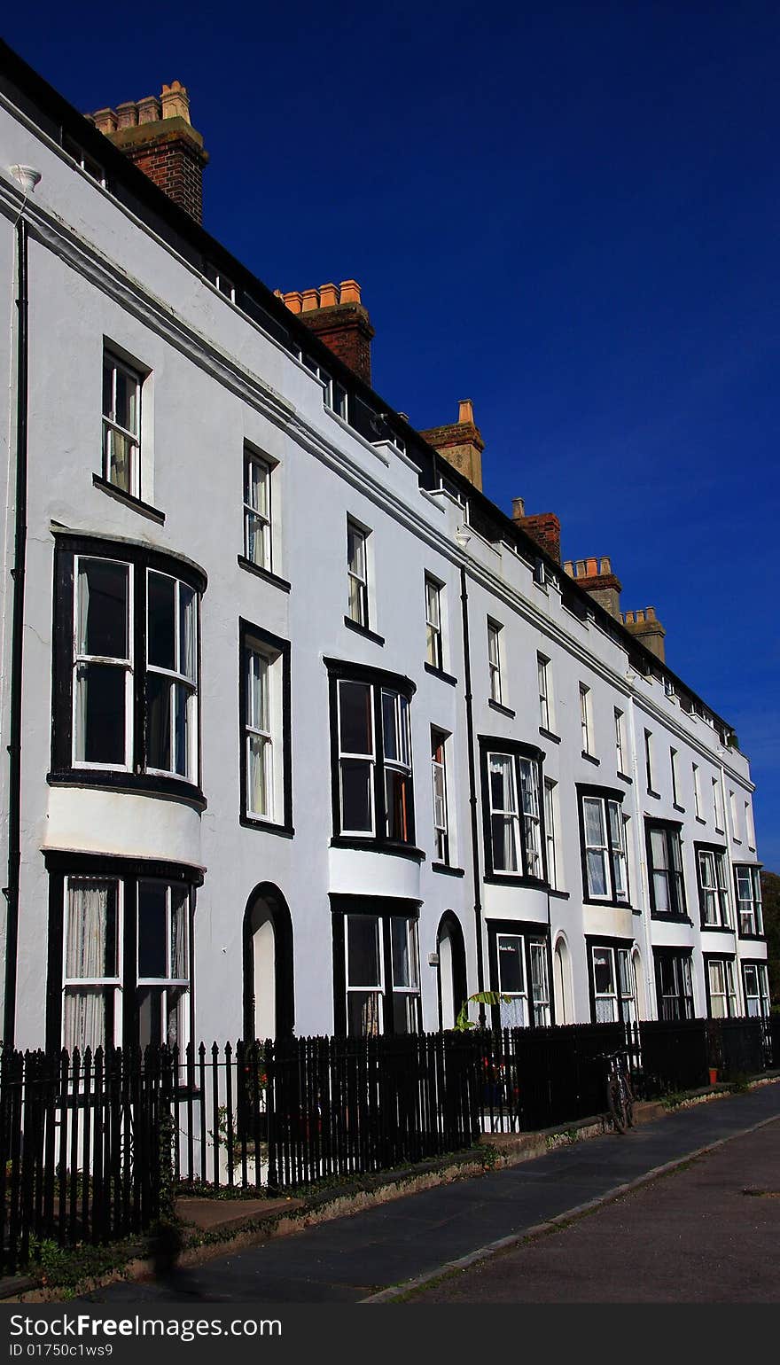 Black and white regency period terrace row housing at Seaton in Devon England. Black and white regency period terrace row housing at Seaton in Devon England