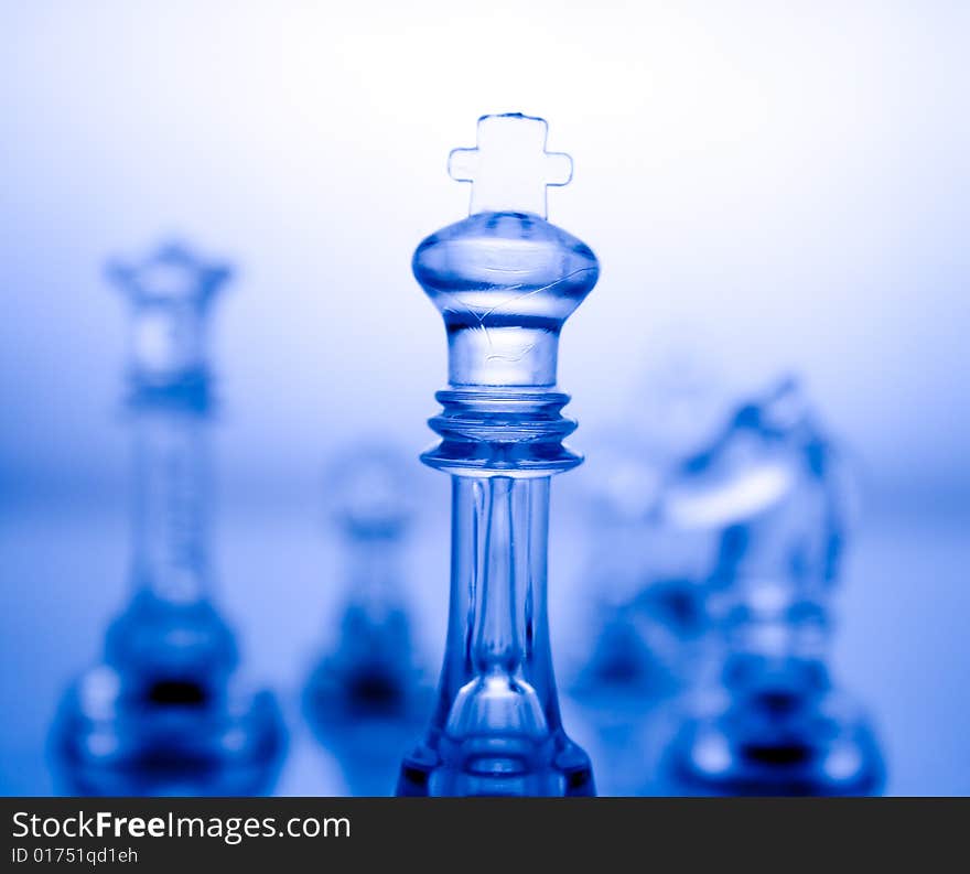 Transparent chess on a blue background. Transparent chess on a blue background