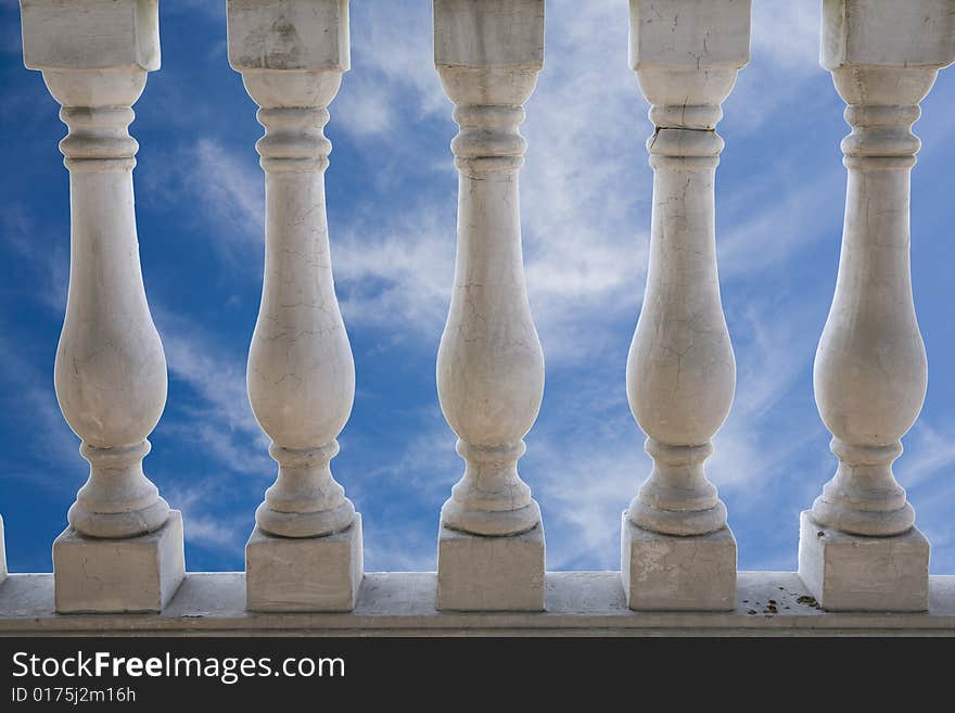 White stone balustrade in blue sky. White stone balustrade in blue sky