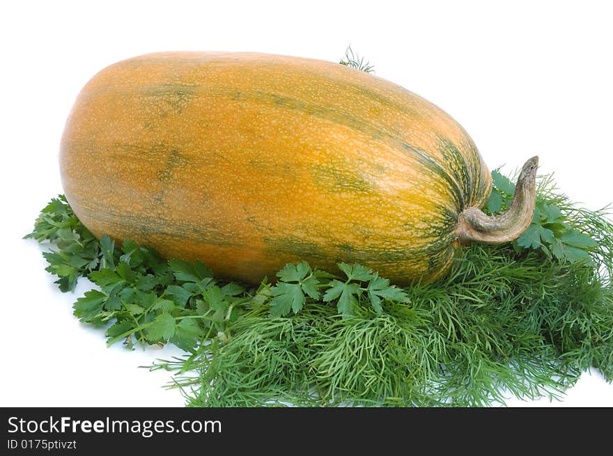 Yellow summer squash and greens on white background. Yellow summer squash and greens on white background