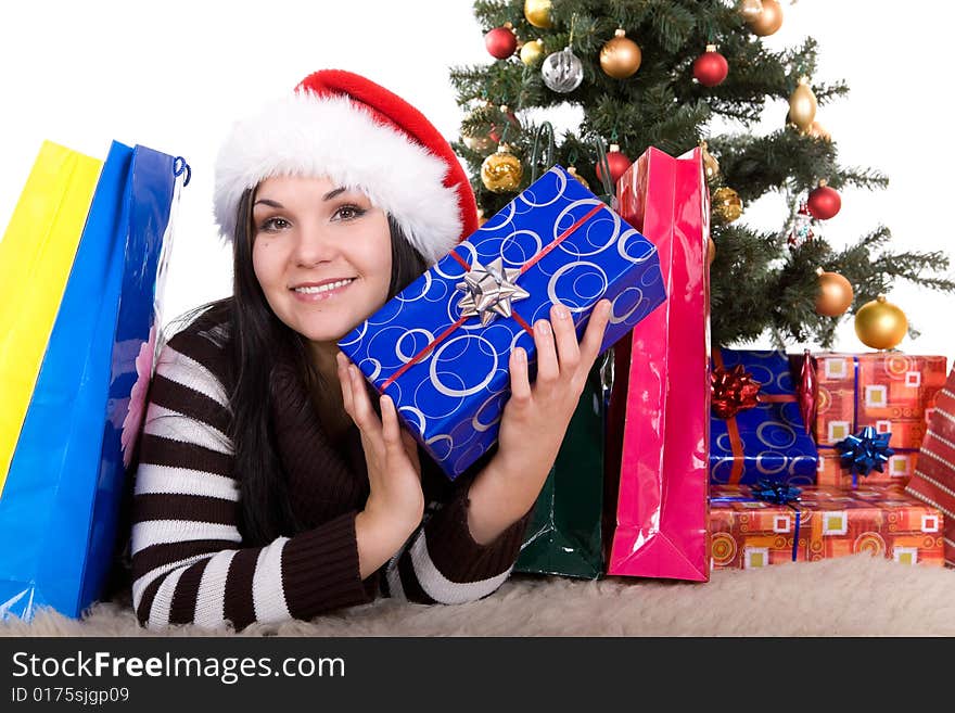 Happy brunette woman over christmas tree. Happy brunette woman over christmas tree