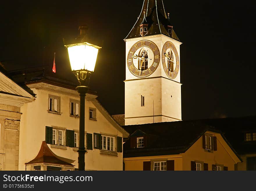 St. Peter's Church tower with Europe?s largest church clock face in Zurich at night. St. Peter's Church tower with Europe?s largest church clock face in Zurich at night