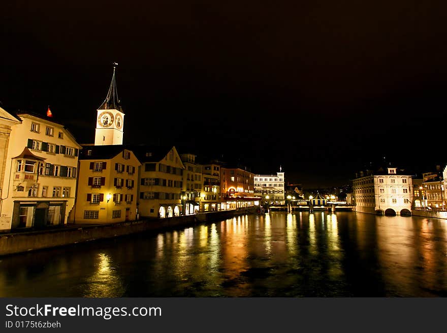 St. Peter's Church tower with Europe?s largest church clock face in Zurich at night. St. Peter's Church tower with Europe?s largest church clock face in Zurich at night