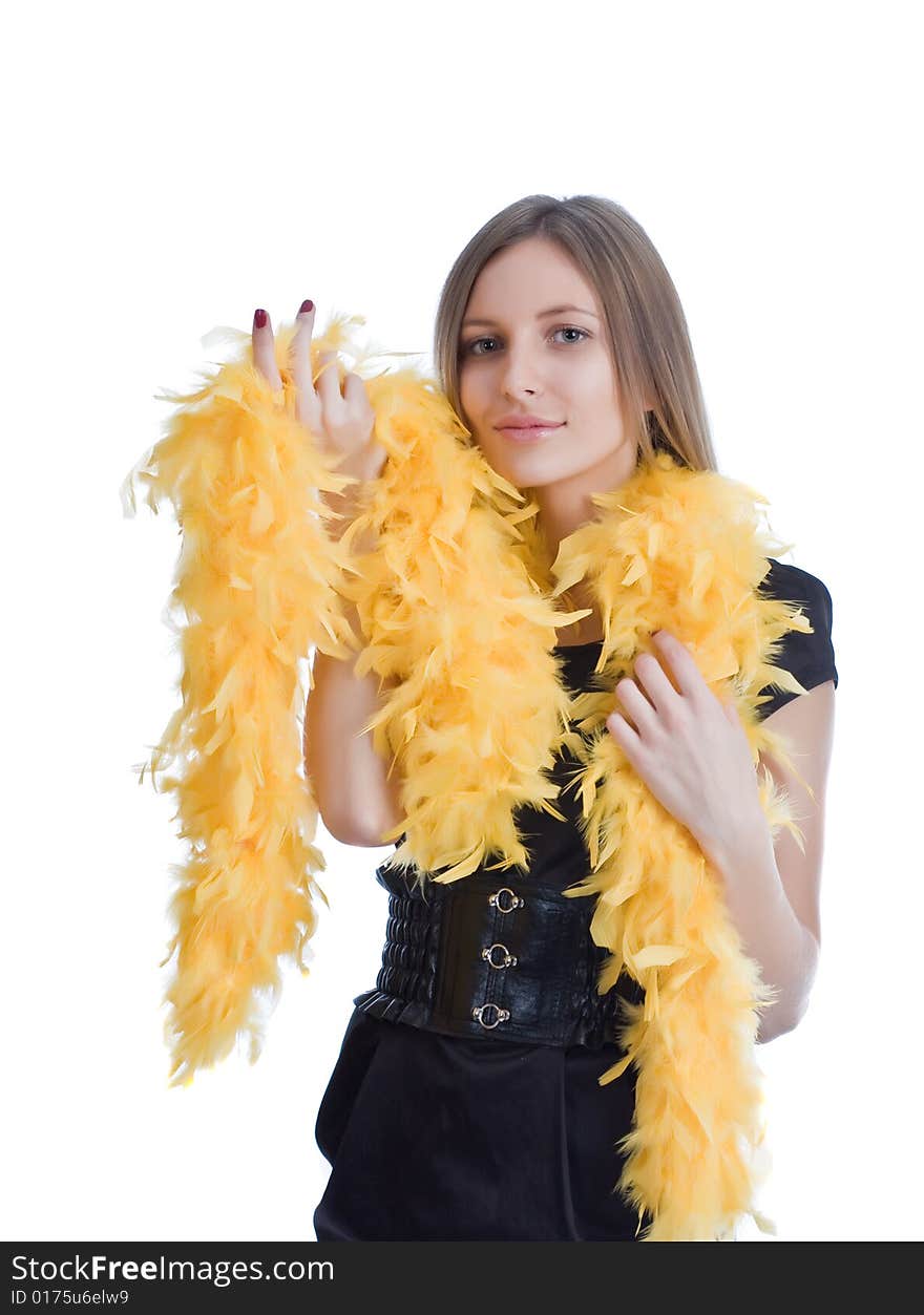 Portrait of the beautiful girl with yello feathers