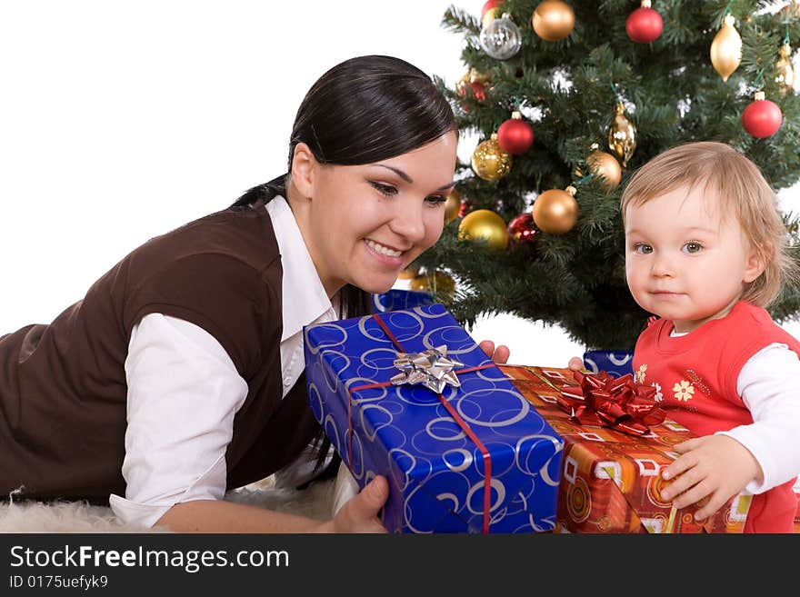 Happy mother and daughter over christmas tree. Happy mother and daughter over christmas tree