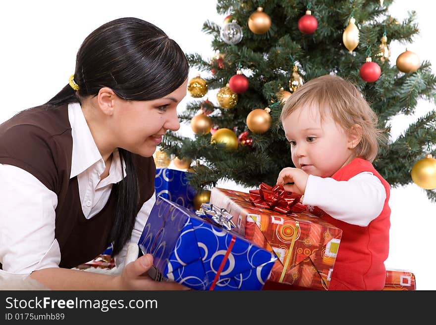 Happy mother and daughter over christmas tree. Happy mother and daughter over christmas tree