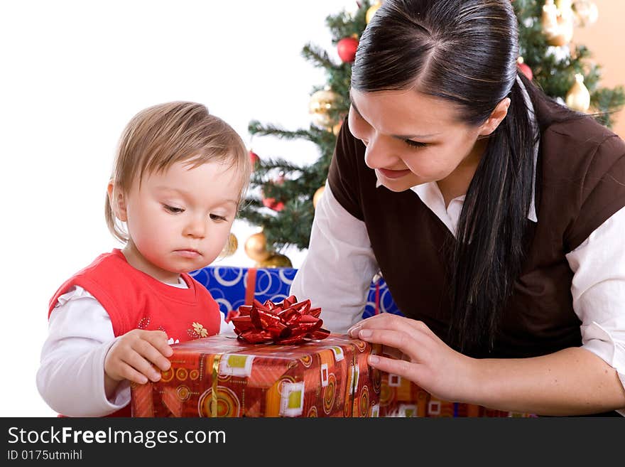 Happy mother and daughter over christmas tree. Happy mother and daughter over christmas tree